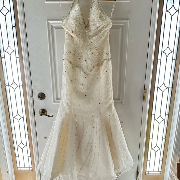 Demetrios Dresses & Skirts - Elegant beaded ivory Wedding Dress with train